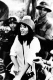 Jane Fonda visited Hanoi in July 1972. Among other statements, she repeated the North Vietnamese claim that the United States had been deliberately targeting the dike system along the Red River. In fact the dike system suffered bomb damage, but was not strategically targeted.<br/><br/>

In North Vietnam, Fonda was photographed seated on an anti-aircraft battery. In her 2005 autobiography, she writes that she was manipulated into sitting on the battery, and was immediately horrified at the implications of the pictures. After the release of the pictures of Fonda seated behind the anti-aircraft gun, she was dubbed "Hanoi Jane" by opponents of the anti-war movement in the United States.